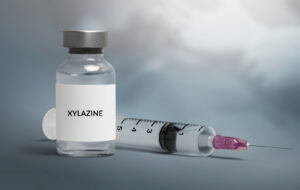 vaccine vial with needle syringe